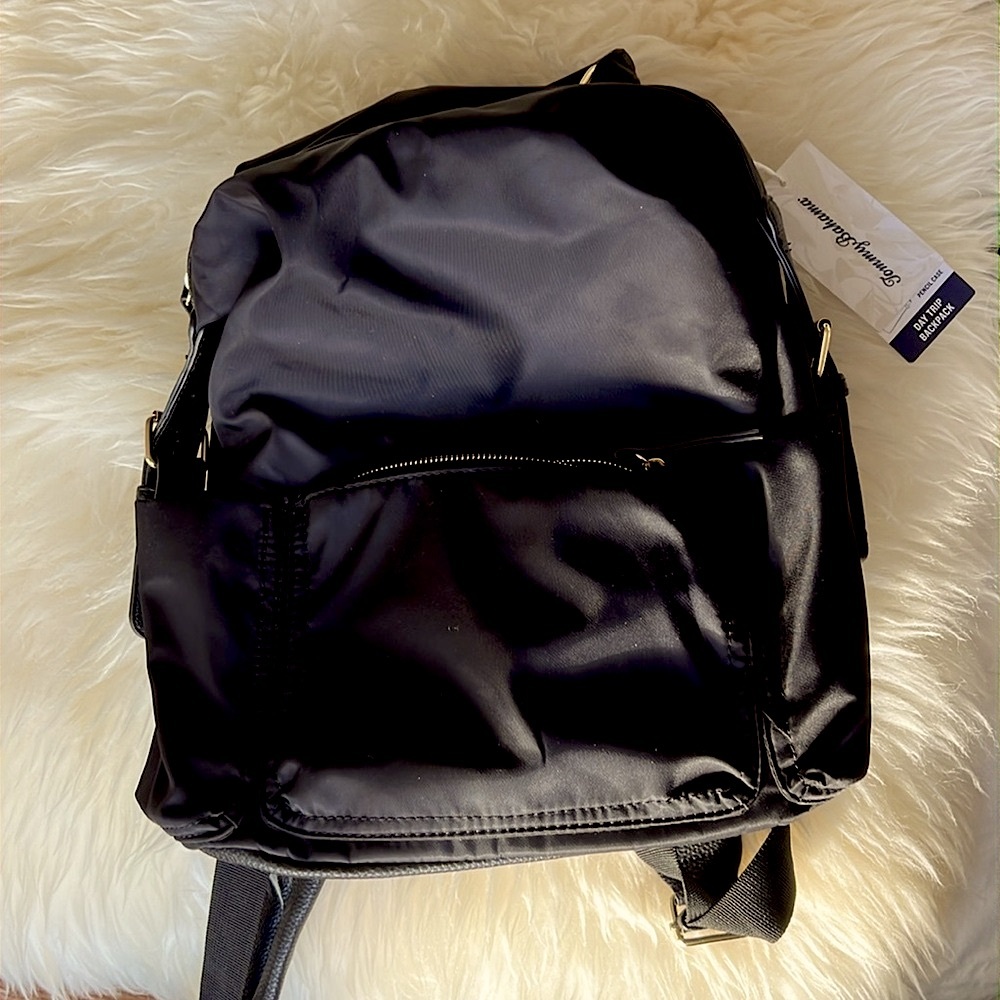 Tommy Bahama backpack in pristine condition, never worn with tags!